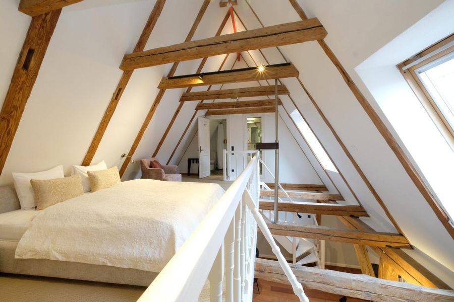 A top-floor loft bedroom